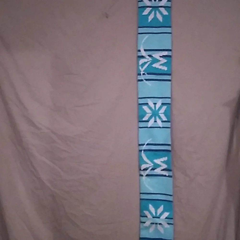 6 x 62 inches including the fringe. Warm winter scarf from Morongo Casino